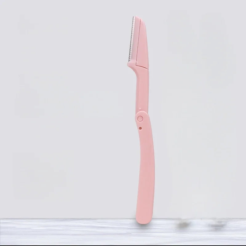 Portable pink color folding eyebrow razor, safe for women's face, suitable for eyebrows, face and lips.