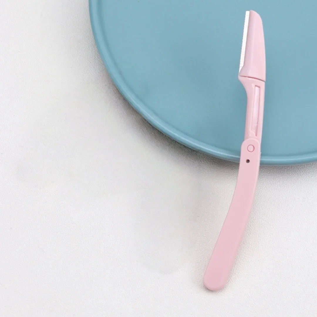 Portable pink color folding eyebrow razor, safe for women's face, suitable for eyebrows, face and lips.